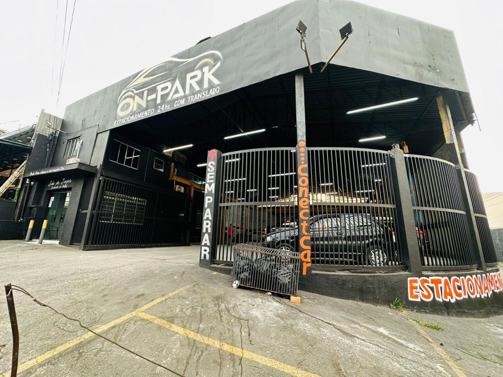 On Park E Estacionamento Traslado *